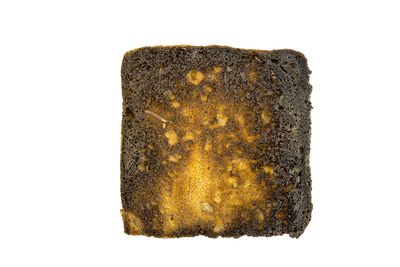 Close-up of bread against white background