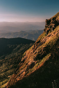 Scenic view of mountains against sky during sunset