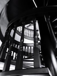 Low angle view of spiral staircase in building