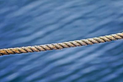 High angle view of rope over sea
