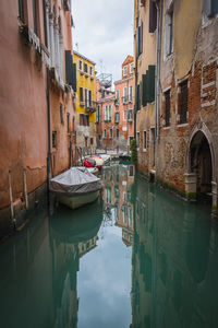 View of canal along buildings