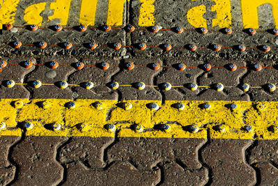 Studded edge of the platform at an irish train station