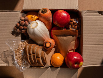 Healthy food delivery harsh shadow. take away products package donation box online shopping delivery