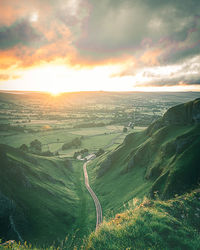 Scenic view of landscape against sky during sunset