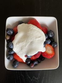 High angle view of strawberries in plate