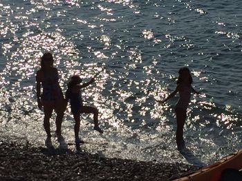 Reflection of people in water