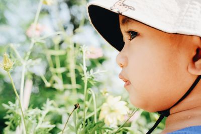 Close-up of young woman looking away