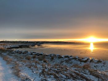 Scenic view of sea against sky during sunset