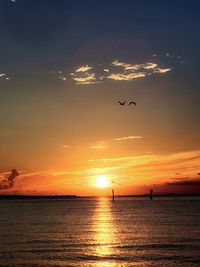 Scenic view of sunset over sea