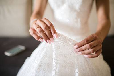 Close-up of woman holding hands