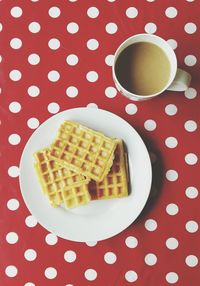 Directly above shot of coffee cup on table