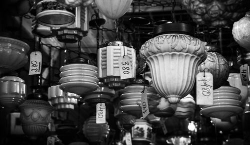 Antique lamps with price tags at shop