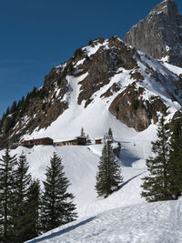 Snow covered mountain against sky