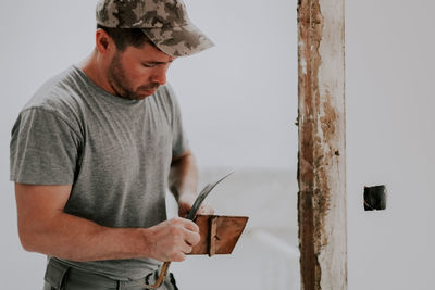 A person working in a doorway.