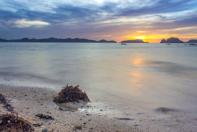 Scenic view of sea at sunset