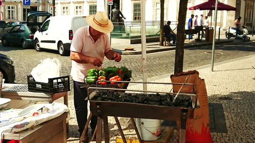 Man for sale at market