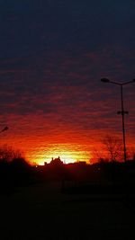 Scenic view of dramatic sky at sunset