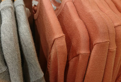 Close-up of clothes hanging at store