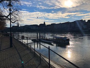 Scenic view of river against sky during sunset