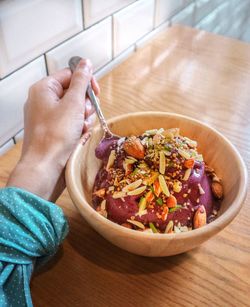 High angle view of hand holding food