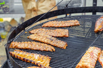 Grilled meat ribs up close. barbecue, grill. cooking meat on coals. delicious juicy meat food