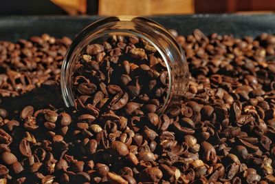 Close-up of coffee beans on table