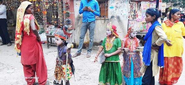 People on street in city