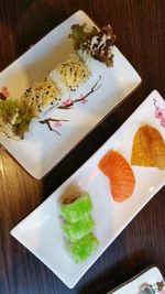 High angle view of sushi served on table