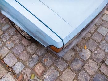 Cropped image of vintage car on street