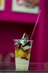 Close-up of ice cream in glass on table