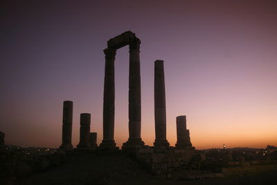 View of old ruins against sky during sunset