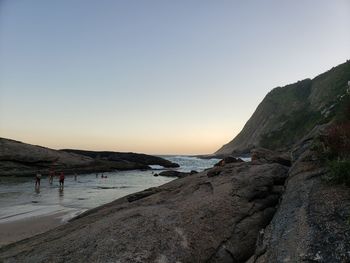 Scenic view of beach against clear sky