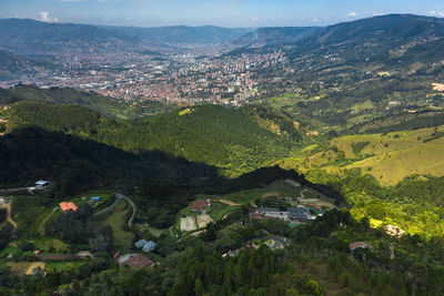 High angle view of townscape and mountains