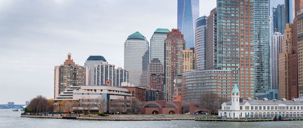 Modern buildings in city against sky