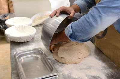 High angle view of man working on table