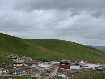 Scenic view of residential buildings against sky