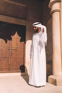 Full length of man standing in building