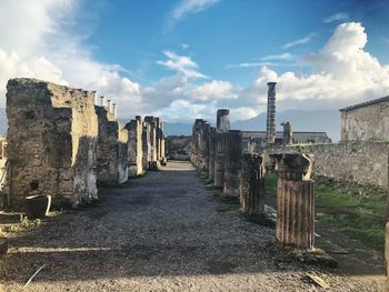 Pompeii ruins against cloudy sky