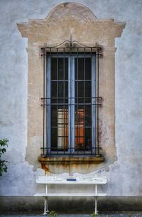 Low angle view of window on old building