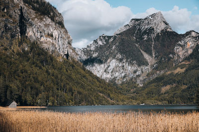 Panoramic view of lake and mountains against sky