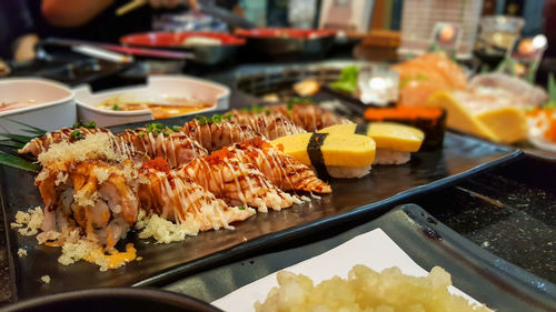 Close-up of sushi served on table