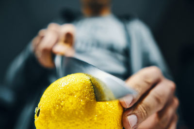 Close-up of hand holding fruit