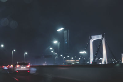 Illuminated street light at night