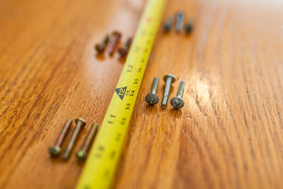 High angle view of text on wooden table
