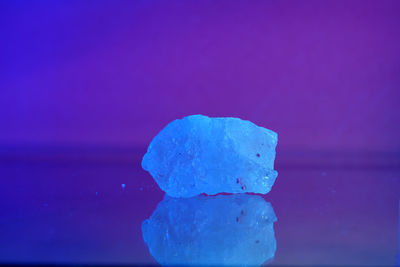 Close-up of ice crystals against blue background