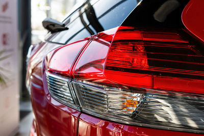 Close-up of red vintage car