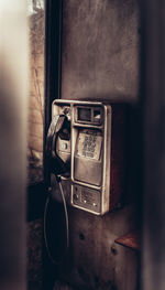 Close-up of old telephone booth