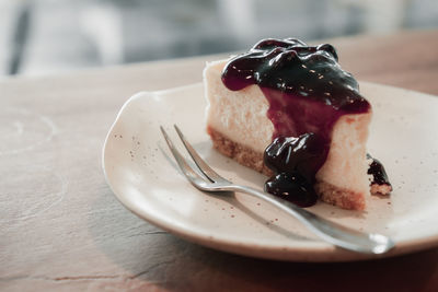 Blueberry pastry cake placed on a white plate