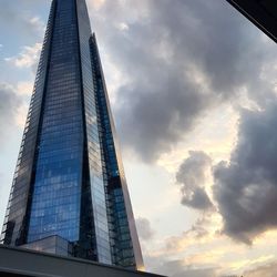 Low angle view of modern building against sky