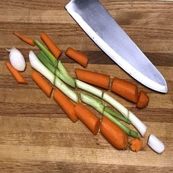 High angle view of chopped vegetables on cutting board